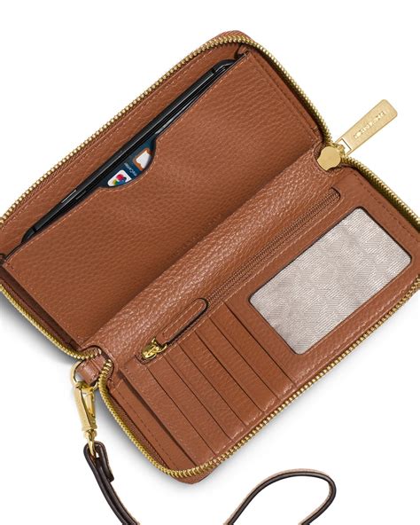 michael kors phone wallet review|Michael Kors multifunction wallet.